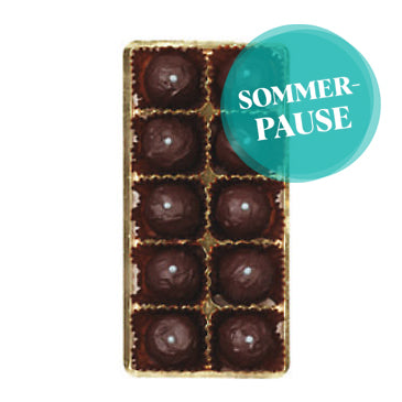 10 Stück Bitterstern Schokoladentrüffel mit einem Aufkleber mit der Aufschrift "Sommerpause"