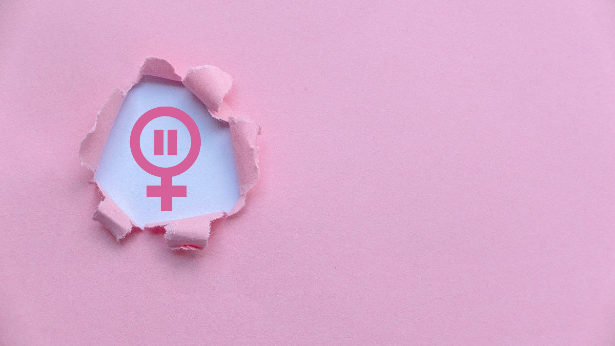 Ein weibliches Symbol auf rosa Hintergrund steht für Sexualität in den Wechseljahren